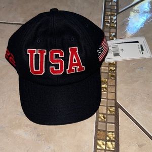 Navy ( more like black ) polo cap